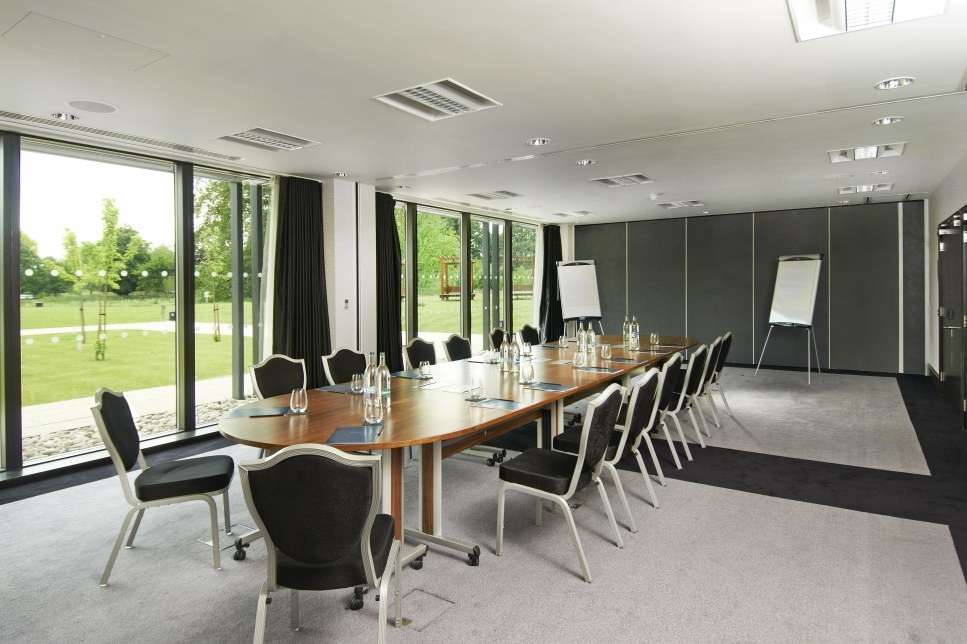Empire set up in a boardroom style, perfect for a productive meeting.