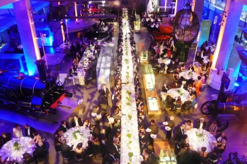 Dinner set-up with round and long tables in Making the Modern World